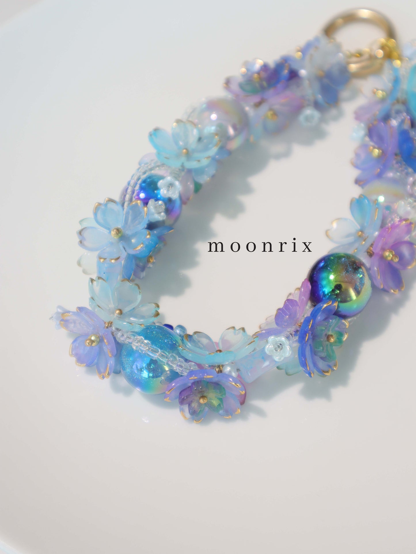 Ocean Blue Secret Garden Phone Charm