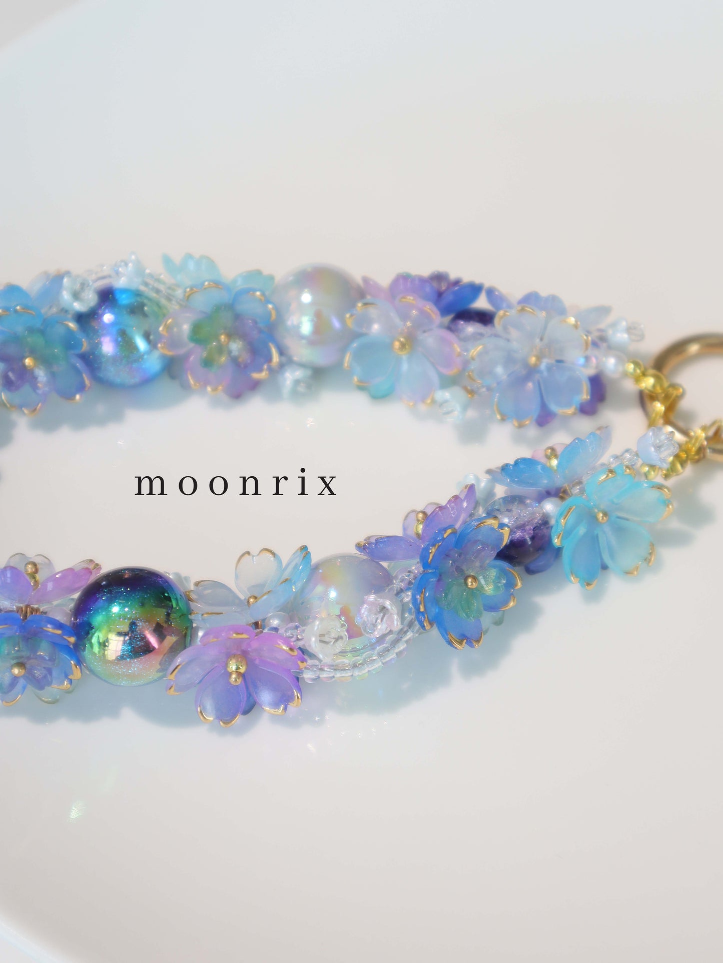 Ocean Blue Secret Garden Phone Charm